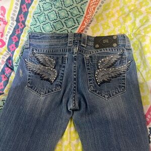 miss me jeans size 28 with a rip in the middle (READ)